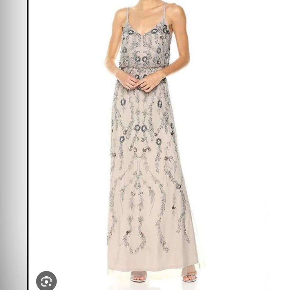 Brand new with tags. Adrianna Papell Platinum beaded gown.